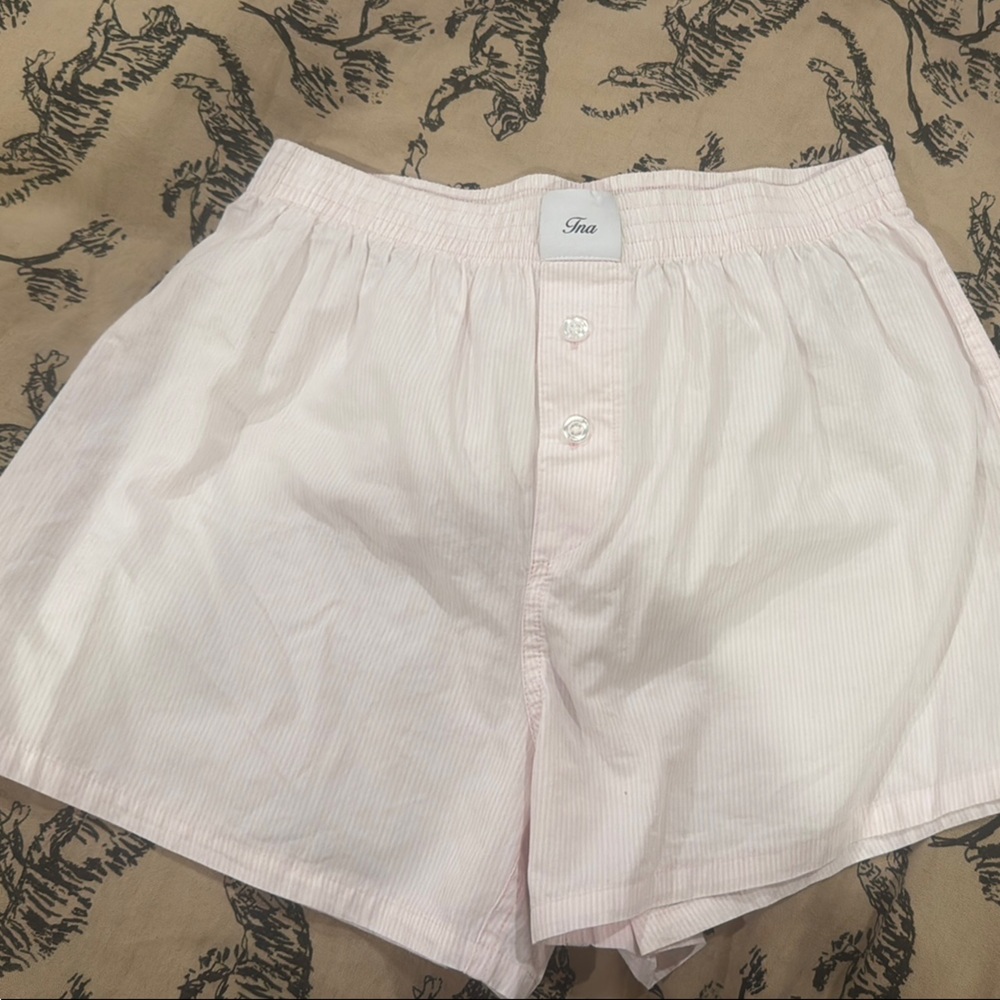 TNA women’s pink and white striped shorts